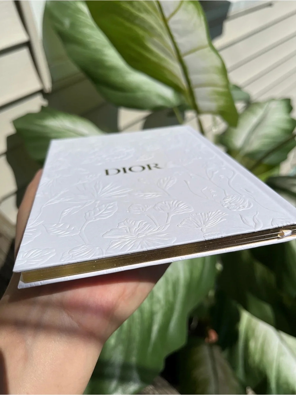 Dior white notebook